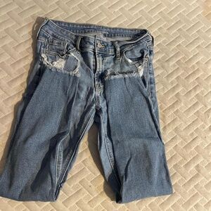 Old Navy Mid-Rise Rockstar Medium Wash Skinny Jeans Size 4